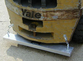 Magnetic Sweeper Mounted on an Airport Tug						

